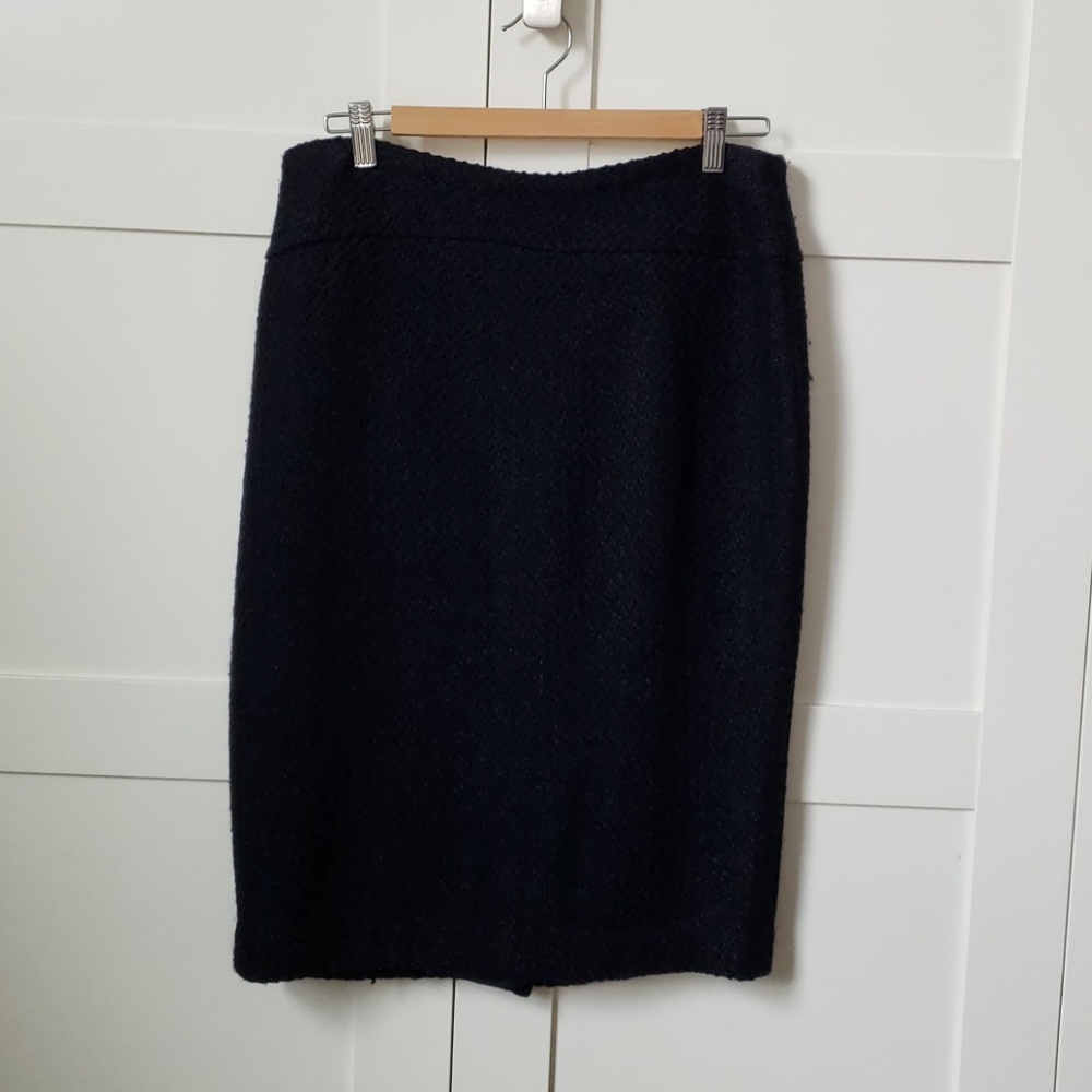 Woven navy skirt. Knee length. New with tags.
